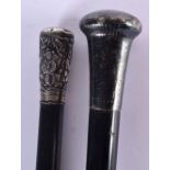 TWO ANTIQUE SILVER MOUNTED WALKING CANES. 90 cm long. (2)