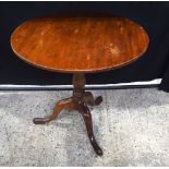 A George III mahogany table with tilt top 73 x 81 cm