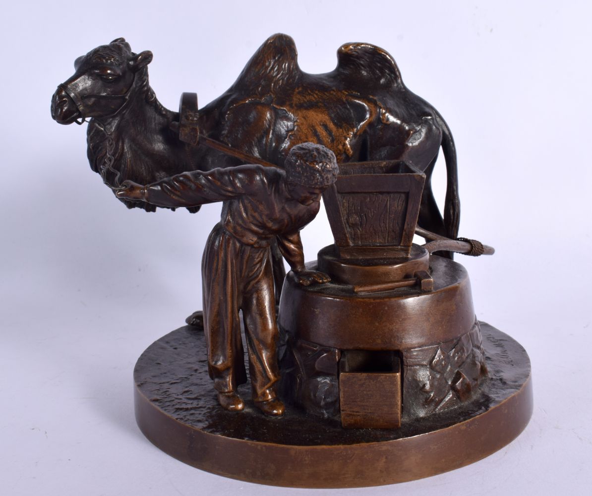 Russian School (19th Century) Bronze, Male with a camel. 14 cm x 14 cm.