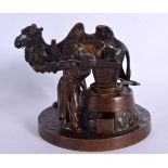 Russian School (19th Century) Bronze, Male with a camel. 14 cm x 14 cm.