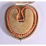 A CASED CORAL NECKLACE. 41cm long, weight 15g, bead size 4.5mm