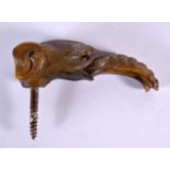 A 19TH CENTURY MIDDLE EASTERN CARVED RHINOCEROS HORN ELEPHANT HEAD WALKING CANE HANDLE. 69 grams. 11