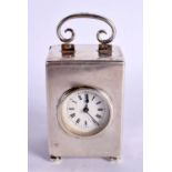 AN EDWARDIAN SILVER CASED CARRIAGE CLOCK. Hallmarked London 1901, 10.5cm x 5.4cm x 5.2cm, weight 354