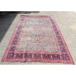 A large Persian Tree of life rug 354 x 233 cm.