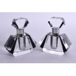 A PAIR OF ART DECO STYLE SCENT BOTTLES. 7.5cm c 7cm x 3cm (2)