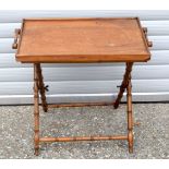 A late 19th Century Butlers tray on a stand 62 x 70 x 42 cm .