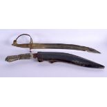 AN EARLY 20TH CENTURY OMANI CARVED RHINOCEROS HORN JAMBIYA DAGGER together with an engraved Indian d