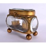 A 19TH CENTURY FRENCH ORMOLU MOUNTED GLASS SCENT CASKET containing two turquoise topped scent bottle