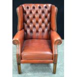 A Leather armchair 96 x 67 x 66 cm