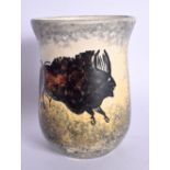 AN UNUSUAL FRENCH PORCELAIN BEAKER painted with bison. 12 cm high.