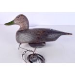 A vintage wooden lead weighted decoy duck 22 x 42 cm.