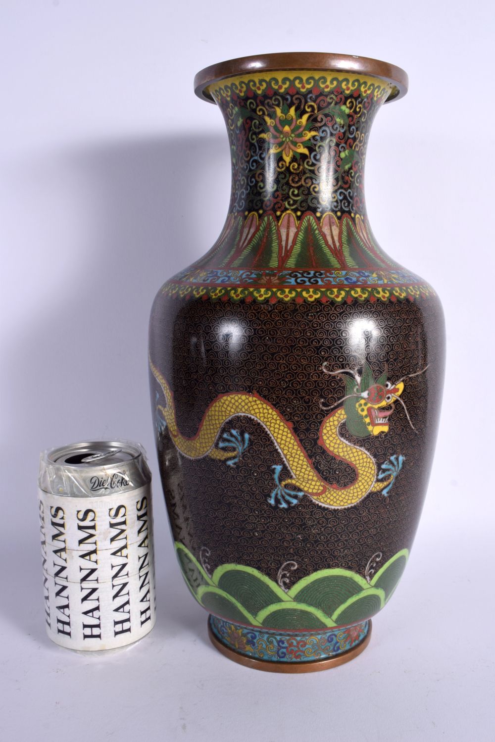 A LARGE LATE 19TH/20TH CENTURY CHINESE CLOISONNE ENAMEL DRAGON VASE decorated with foliage. 34 cm hi