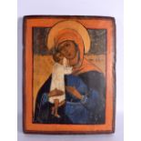 A RUSSIAN CARVED WOOD ICON. 30 cm x 25 cm.