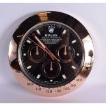 A ROLEX SHOP DISPLAY ADVERTISING WALL CLOCK. 33 cm diameter.