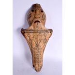 A RARE 19TH CENTURY CONTINENTAL TRIBAL CARVED AND ENGRAVED HORSE SKULL decorated with animals and mo