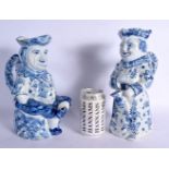 A LARGE PAIR OF ANTIQUE DELFT BLUE AND WHITE CHARACTER TOBY JUGS painted with motifs. 27 cm x 14 cm.