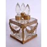 AN EARLY 20TH CENTURY FRENCH NEO CLASSICAL TRIPLE GLASS SCENT BOTTLE HOLDER. 12 cm x 7 cm.