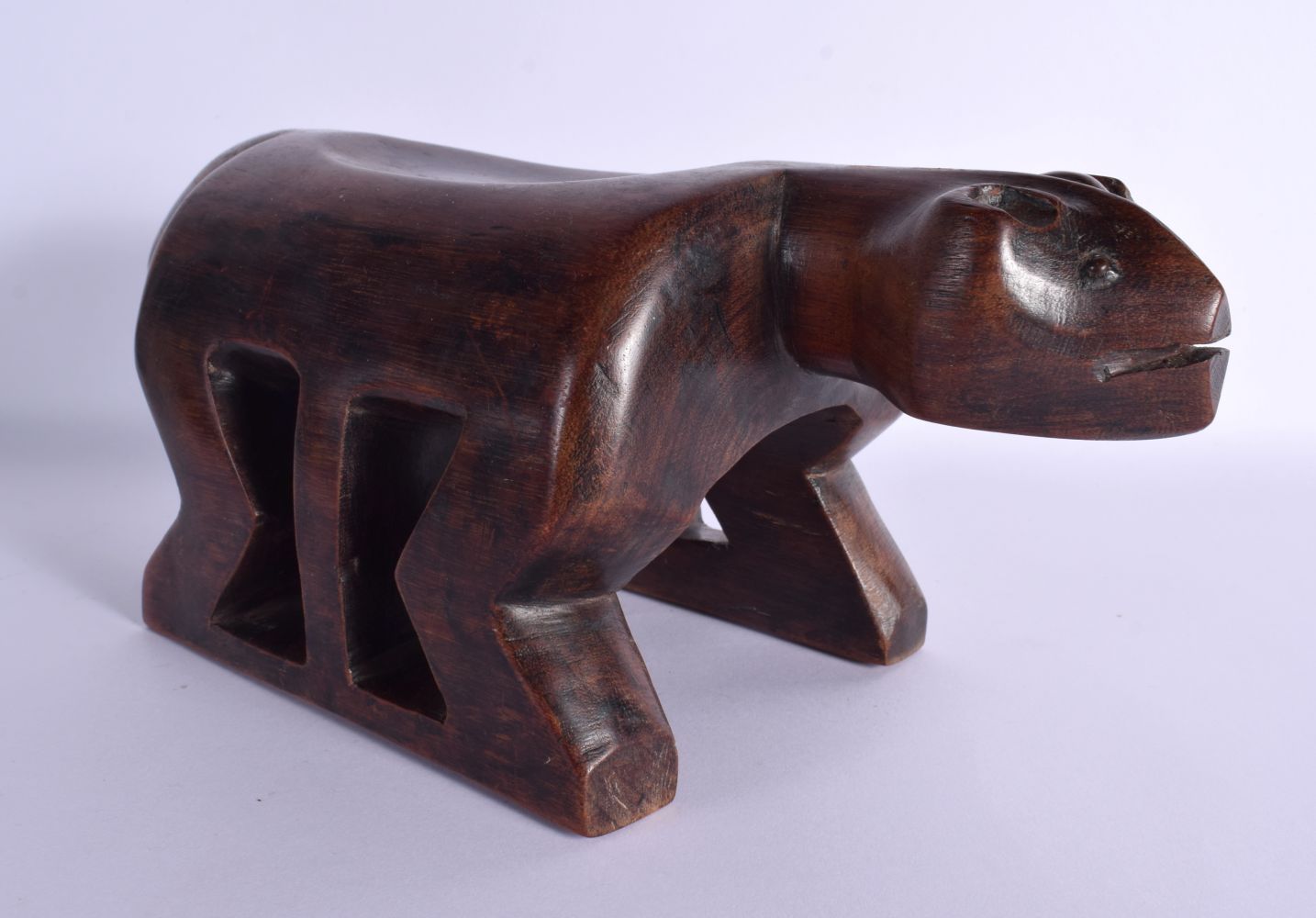 AN UNUSUAL TRIBAL CARVED WOOD ZOOMORPHIC TYPE ANIMAL HEADREST modelled upon all fours. 32 cm x 15 cm - Image 4 of 6