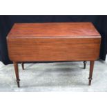 A mahogany drop leaf table 73 x 112 x 107 cm