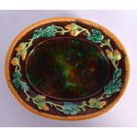 A VICTORIAN GEORGE JONES MAJOLICA OVAL DISH STAND. 18 cm x 12 cm.