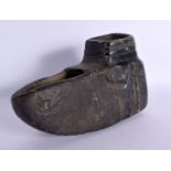 A VERY EARLY CONTINENTAL CARVED STONE TRIBAL OIL TYPE LAMP possibly North American Argallite. 16 cm