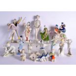 A COLLECTION OF FIFTEEN UKRAINIAN PORCELAIN FIGURES in various forms and sizes. Largest 25 cm high.