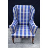 A good Howard and Sons deep country house armchair with number to legs. 107 x 85 x 81 cm