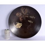 A LARGE EARLY 20TH CENTURY LACQUERED PAPIER MACHE BOWL decorated with fish and sea weed. 40 cm diame