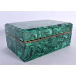 A FINE EARLY 20TH CENTURY RUSSIAN MALACHITE BOX AND COVER of naturalistic form. 15 cm x 10 cm.