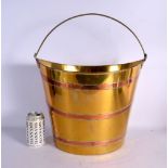 A GEORGE III COPPER AND BRASS BUCKET. 54 cm x 38 cm inc handle.