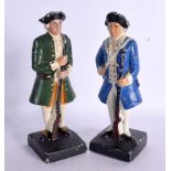 TWO VINTAGE CAST IRON SOLDIERS 19 cm high.