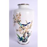 A JAPANESE TAISHO PERIOD CLOISONNE ENAMEL VASE decorated with foliage. 19 cm high.