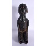AN UNUSUAL AFRICAN TRIBAL POLYCHROMED TERRACOTTA FIGURE modelled as a seated male. 31 cm high.