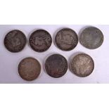 FOUR ENGLISH CROWN COINS AND THREE AMERICAN DOLLARS (7). Weight 190g