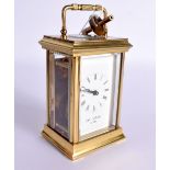 A WILLIAM WIDDOP CARRIAGE CLOCK. 12cm x 7.8cm x 6.5cm (excl handle)