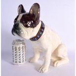 A LARGE ART DECO AUSTRIAN FIGURE OF A DOG modelled recumbent 26 cm x 21 cm.