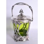 A STYLISH WMF ART NOUVEAU SILVER PLATED GREEN GLASS BISCUIT BARREL AND COVER. 25 cm x 12 cm.