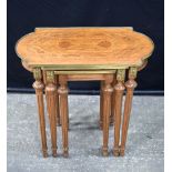 A nest of marquetry topped table with brass edging 60 x 66 x 37 cm. (3).