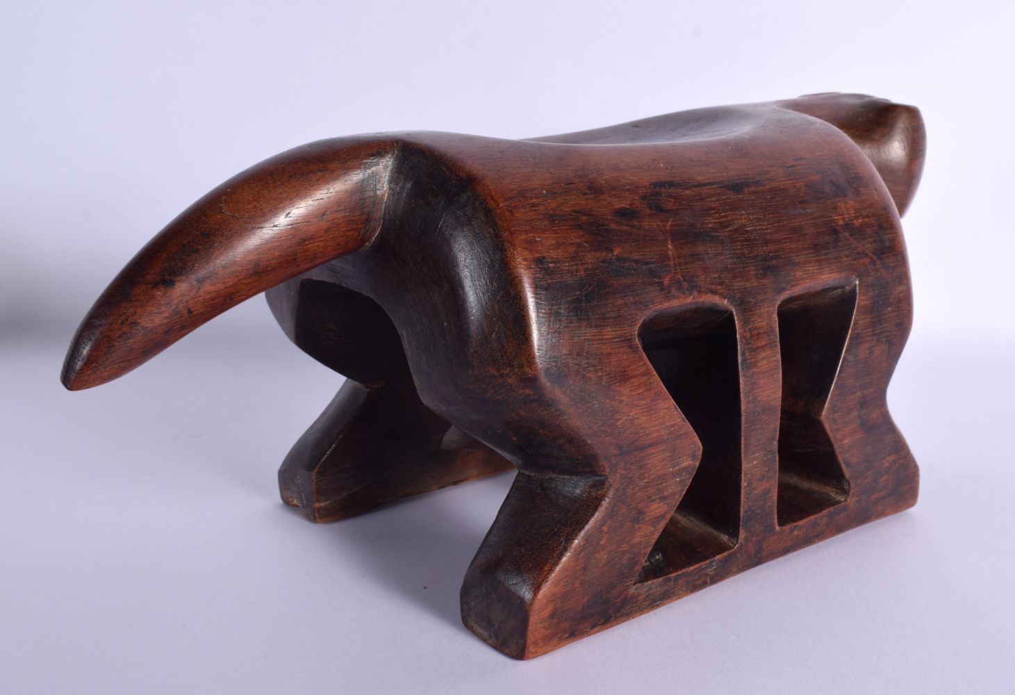 AN UNUSUAL TRIBAL CARVED WOOD ZOOMORPHIC TYPE ANIMAL HEADREST modelled upon all fours. 32 cm x 15 cm - Image 3 of 6