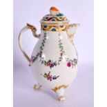 18th c, Ludwigsburg three footed jug and cover painted with swags of flowers. 14cm High