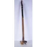 An antique Willie Dunn hickory shafted golf wood together with three other hickory shafted golf club
