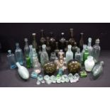 A collection of vintage/antique beverage bottles, apothecary items (Qty).