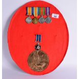 A MOUNTED COLLECTION OF MEDALS AND DEATH PLAQUE RELATING TO 66881 PTE D T THORNEYCROFT OF THE ROYAL