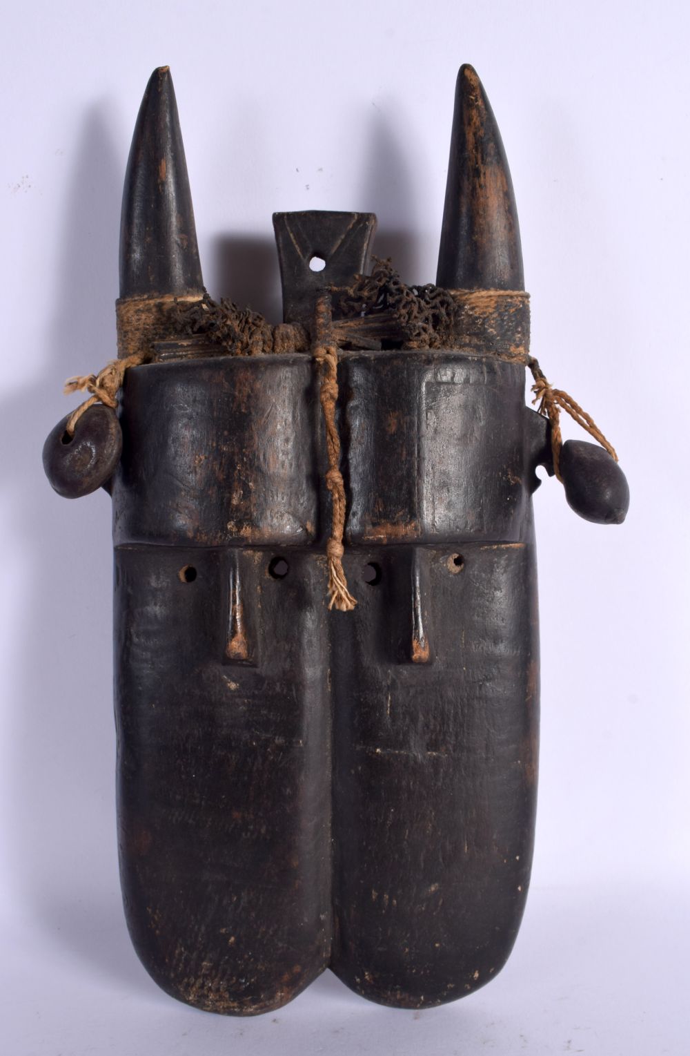 AN EARLY 20TH CENTURY AFRICAN CARVED WOOD TRIBAL MASK. 30 cm x 18 cm.