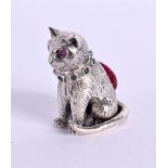 A MINIATURE STERLING SILVER PIN CUSHION IN THE FORM OF A SEATED CAT. Stamped Sterling 925, 2.5cm c