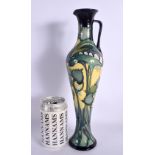A LARGE MOORCROFT LIMITED EDITION JUG No 82 of 200. 32 cm high.