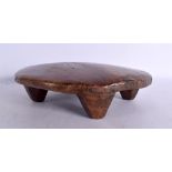 AN UNUSUAL AFRICAN TRIBAL CARVED WOOD HEAD REST. 21 cm x 16 cm.
