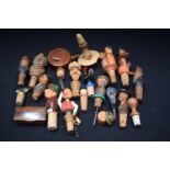 A collection of wooden novelty bottle stoppers some antique (18)