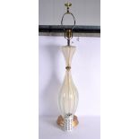 A LARGE VINTAGE ITALIAN MURANO TYPE IRIDESCENT GLASS LAMP with brass mounts. 82 cm high.