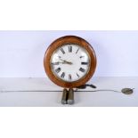 A wooden surround wall clock. Diameter 38cm.